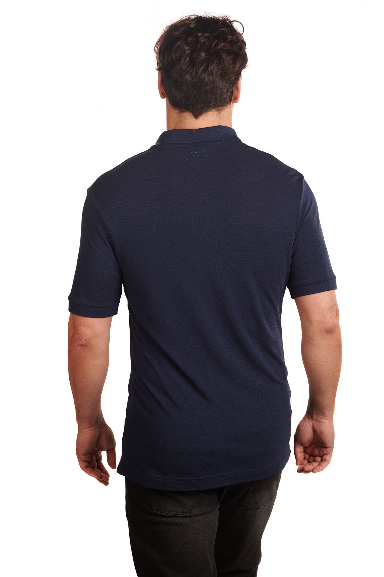 midnight-blue-biodegradable-pure-merino-wool-golf-polo-shirt-for men-by-snöleo.-back-of-model-view.